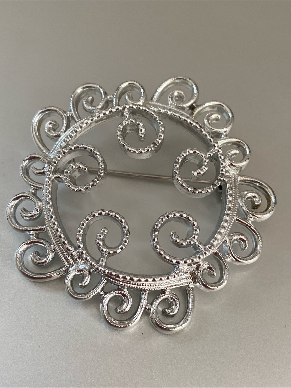 Sarah Coventry vintage Silver-Tone Filigree Swirl Brooch